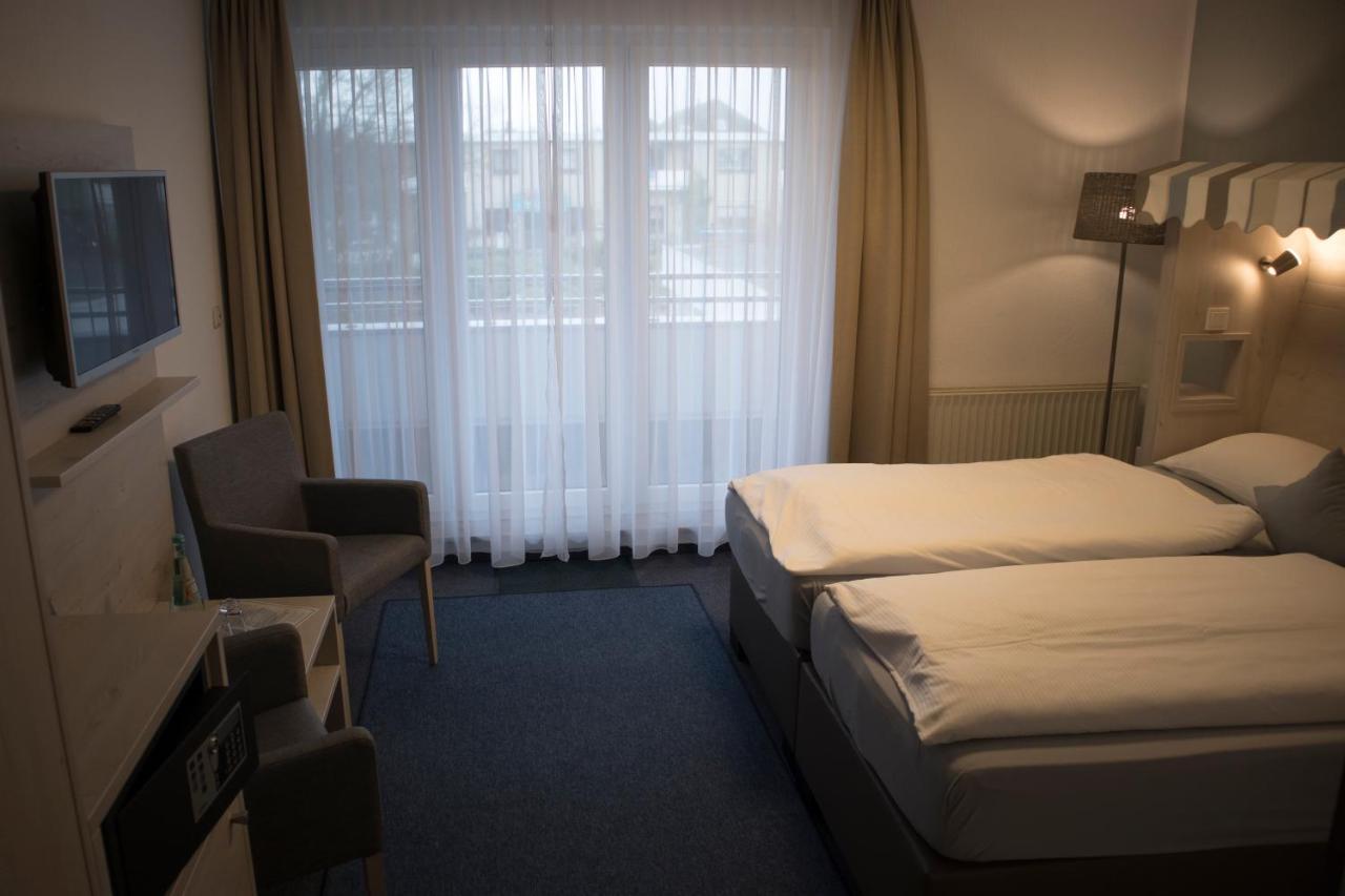 Hotel Am Friesenstrand Tossens Exteriör bild