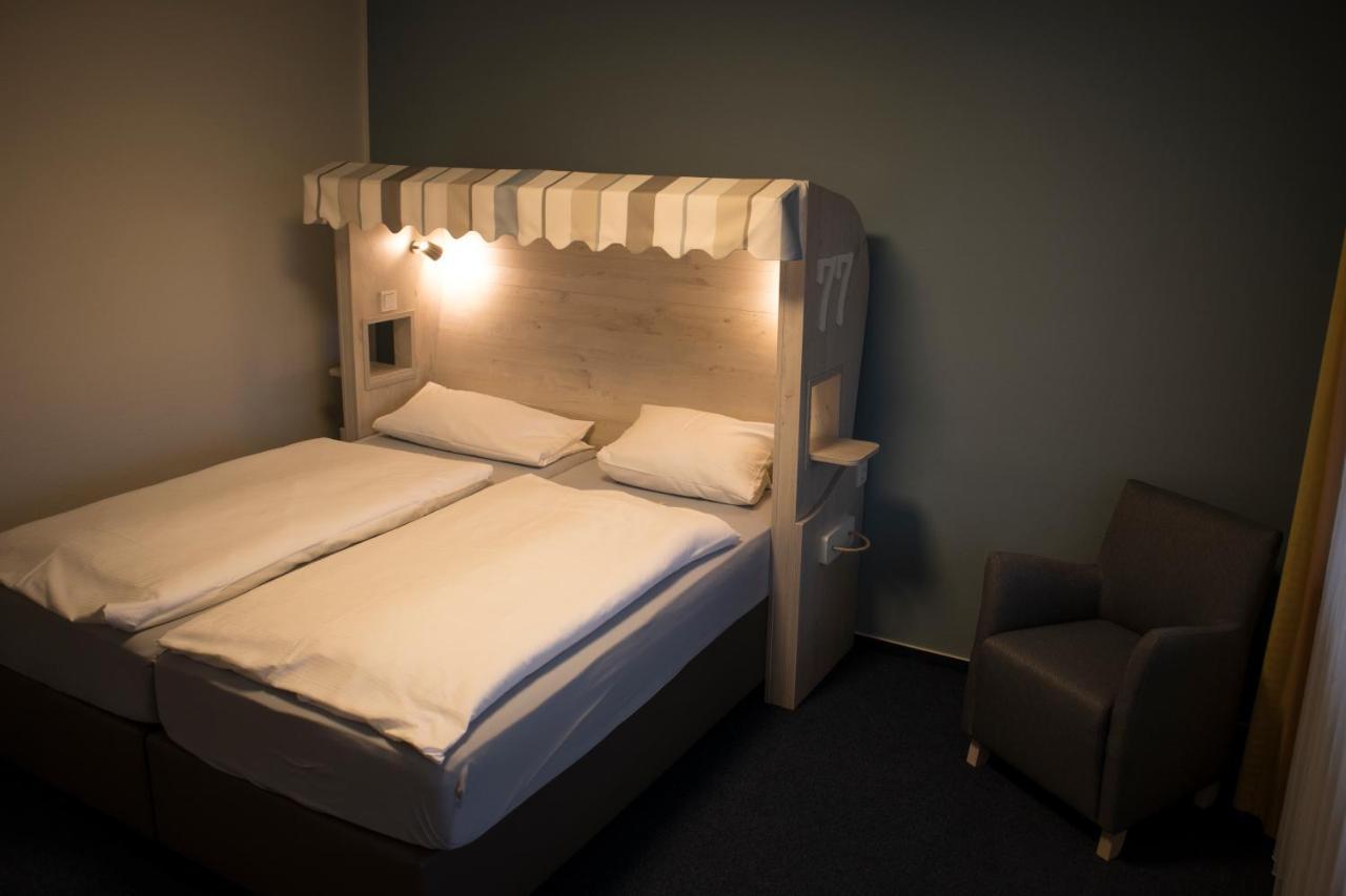Hotel Am Friesenstrand Tossens Exteriör bild