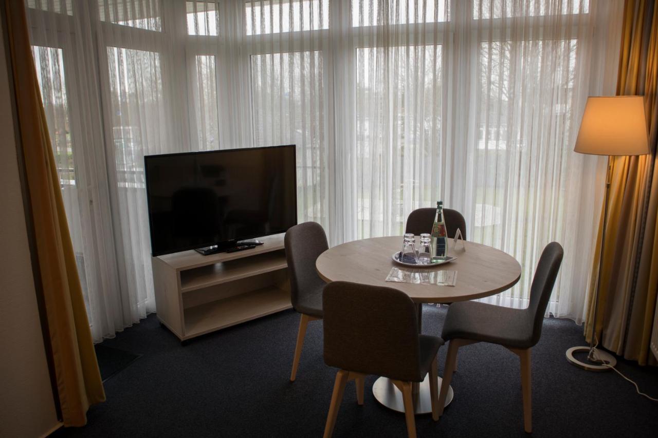 Hotel Am Friesenstrand Tossens Exteriör bild