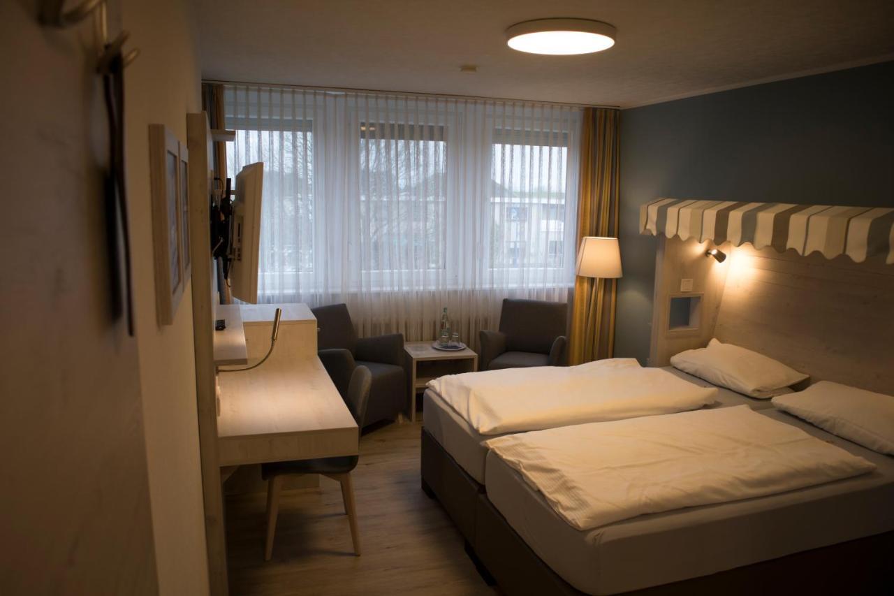 Hotel Am Friesenstrand Tossens Exteriör bild