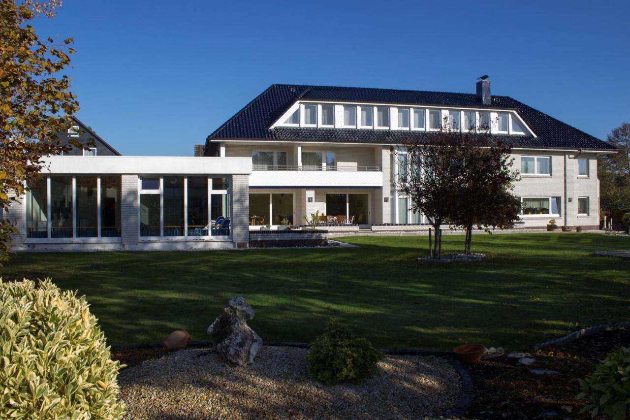 Hotel Am Friesenstrand Tossens Exteriör bild