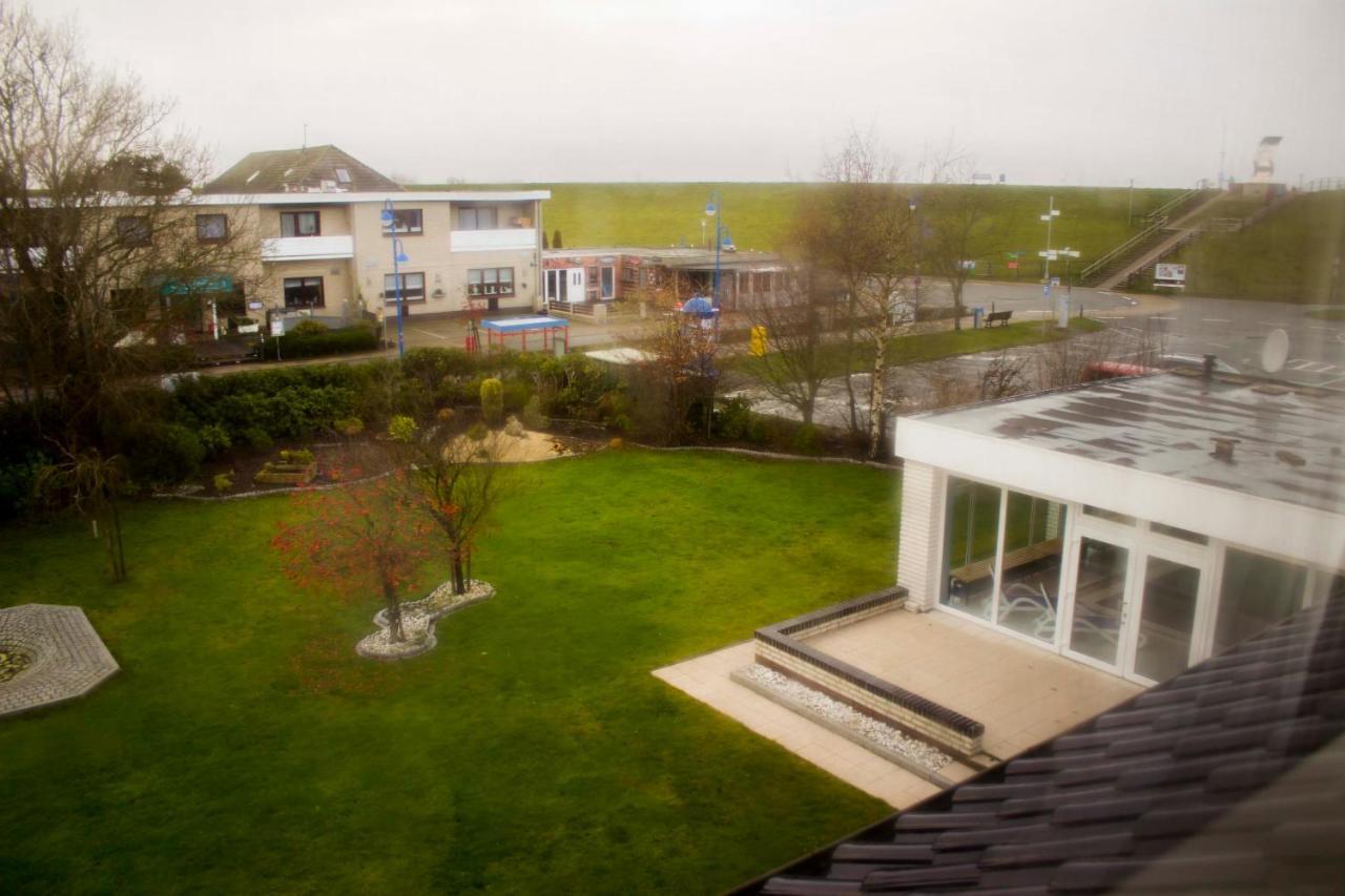 Hotel Am Friesenstrand Tossens Exteriör bild
